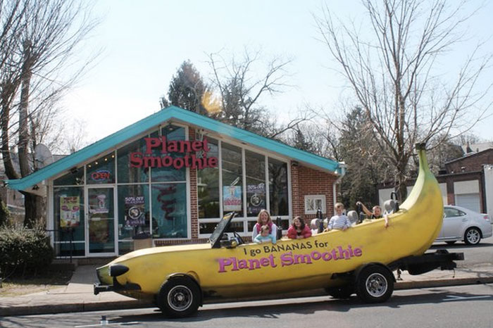 Planet Smoothie is always rolling out new ways to attract customers — and few things draw more attention than a giant banana-mobile!