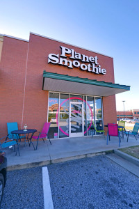 planet smoothie franchise exterior with pink chairs / evolving menu