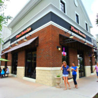 Planet Smoothie Franchise entrance with people
