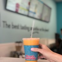 franchise cost hand holding smoothie