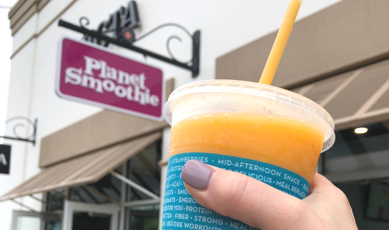 shot of a smoothie outside of a smoothie franchise / Reopening Communities